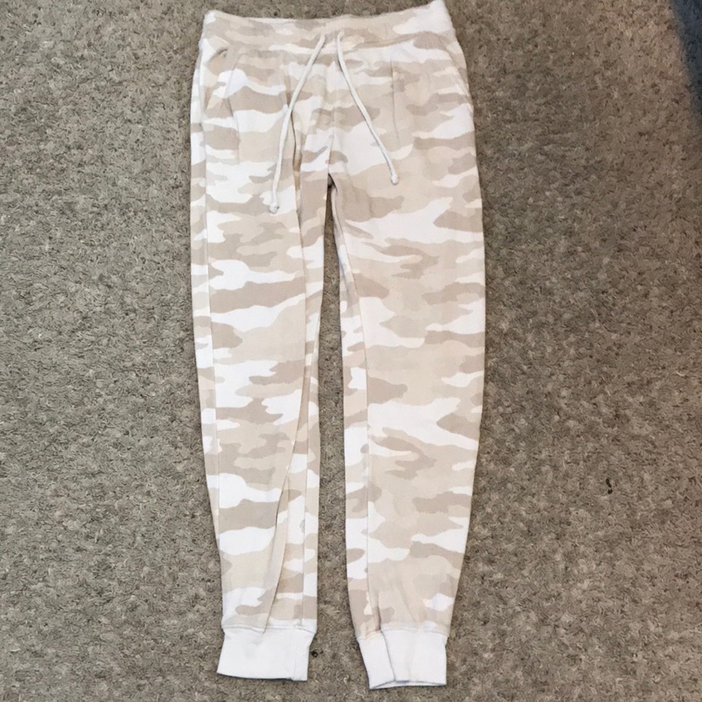 Tan, cream, and white sweatpants